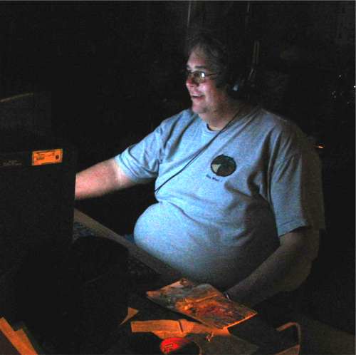 An eerie computer screen lit Jimmy Moore